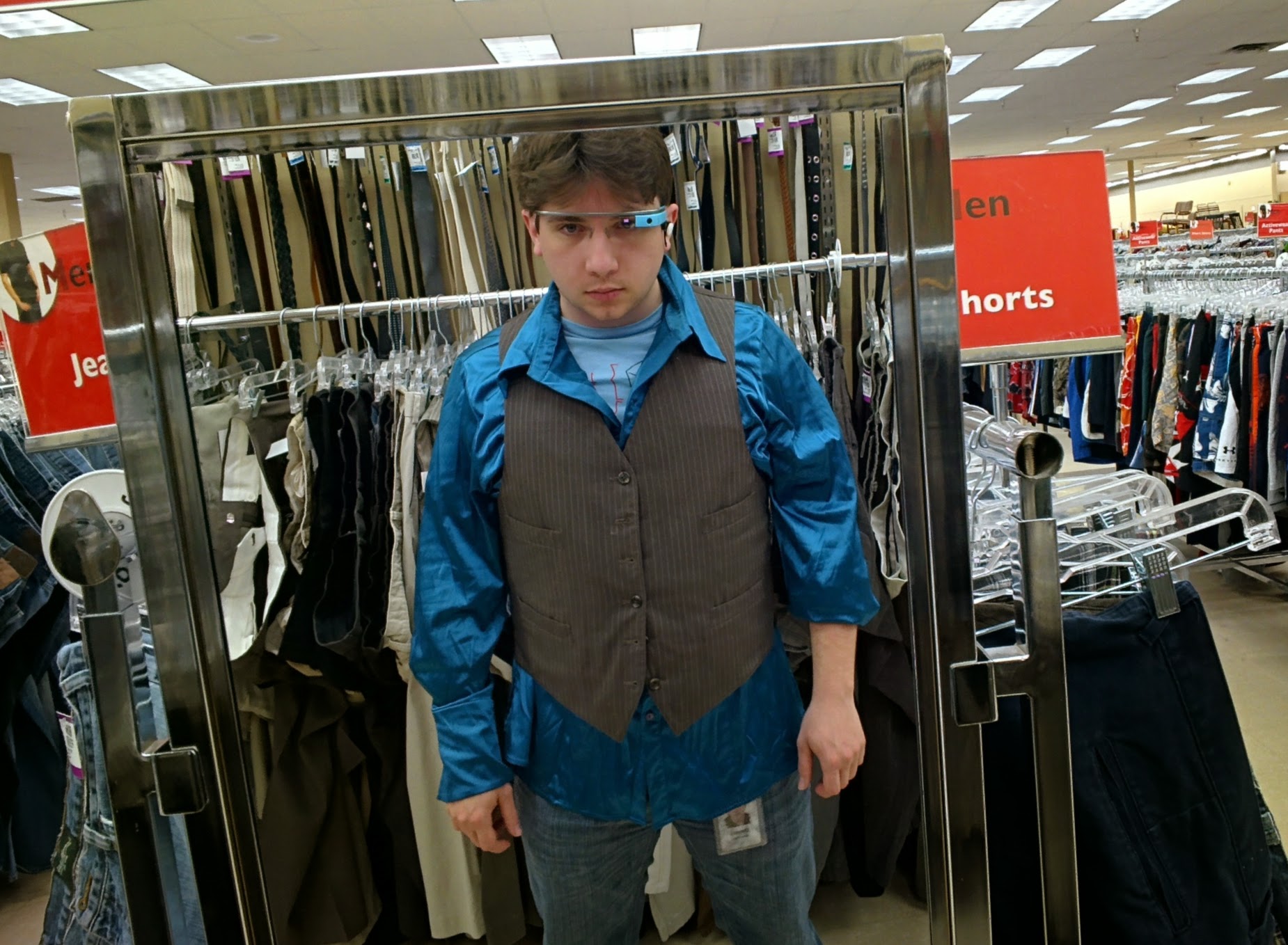 Jimmy trying on a costume at Value Village
