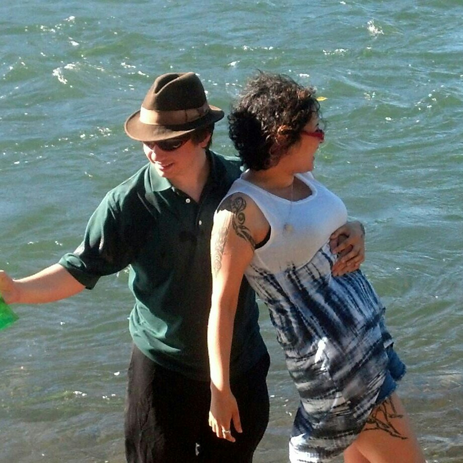 Jimmy and Sori playing in water